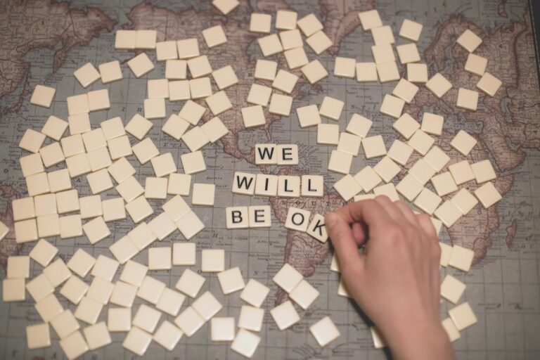 person standing on brown and white floor tiles